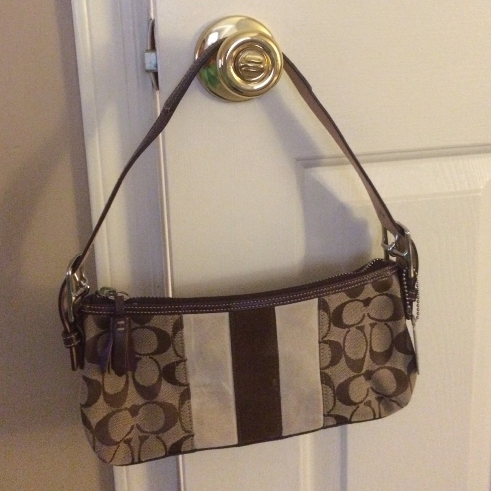 - Coach signature purse